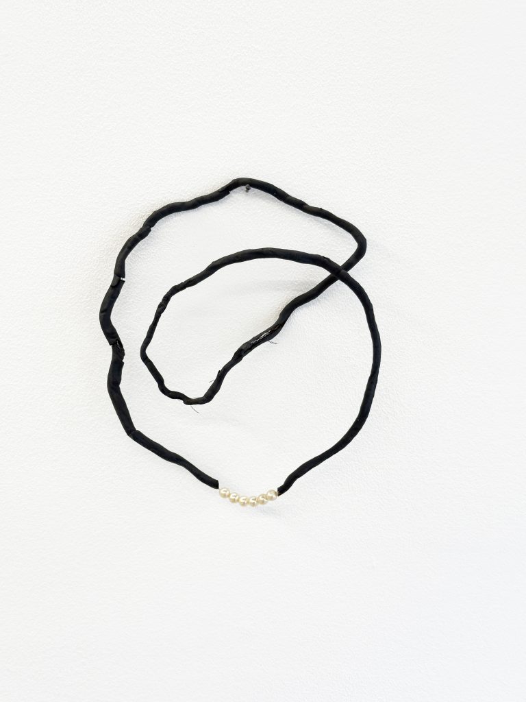 Henrik Strömberg Loop 01, 2026 cut out root system piece and part of repurposed pearl necklace 23 x 21 x 4 cm